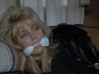 Heather Locklear is a tied up policewoman