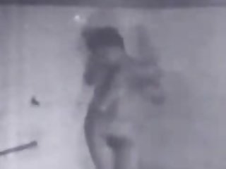 Spying on a Showering Mature MILF