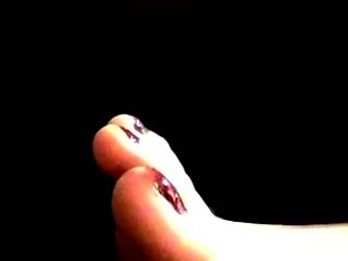 Women getting pedicure from a foot