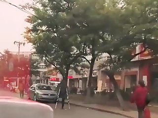 Crutching Amputee Girl in China on Street